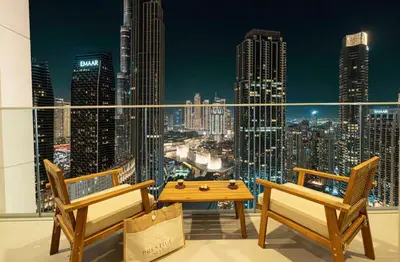 a balcony with a view of a city skyline at the space in Dubai