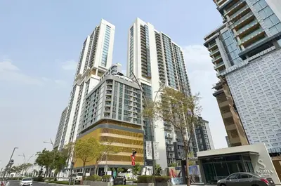a group of tall buildings in a city at STAY BY LATINEM Luxury 1BR Holiday Home CD 0602 Near Burj Khalifa in Dubai