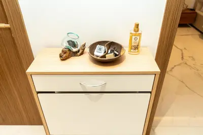a table with a bowl on top of a drawer at 1Luxury Newbedroom nearBusiness Bay in Dubai