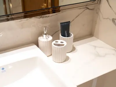 a bathroom with two toothbrushes and a sink at 1Luxury Newbedroom nearBusiness Bay in Dubai