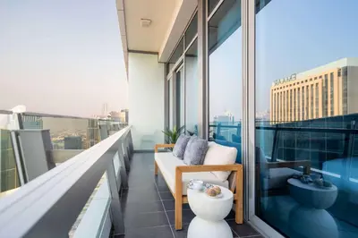 a balcony with a toilet on top of a building at Frank Porter - Silverene Towers in Dubai