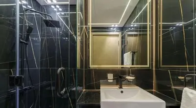 a bathroom with a sink and a mirror at Luxe studio Downtown Burj Khalifa Skyline view in Dubai