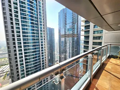 a balcony with a view of a city at Beautiful 1-BR next to Barasti Beach in Dubai