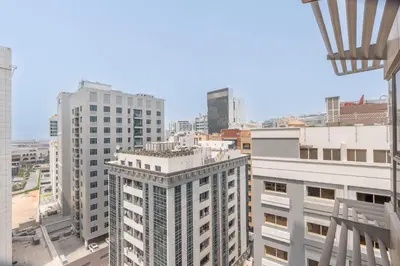 a view of a city skyline with tall buildings at StayShort - Roomy 2BR in Al Barsha with Balcony - Sleeps 4 in Dubai