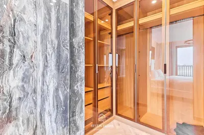 a glass walk in shower in a room at Luxury Elie Saab 3BR Villa in Jasmine Lane in Dubai