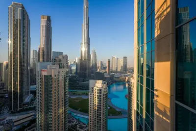 a view of a city with tall buildings at Downtown 1BR Full Burj Khalifa & Fountain Views in Dubai