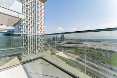 a view from the glass floor of a building at City Living with Street Views, Just a Walk to Bus Stop, Easy Transport to Burj Khalifa and Dubai Mall, Nobles Tower, Business Bay by Deluxe Holiday Homes in Dubai
