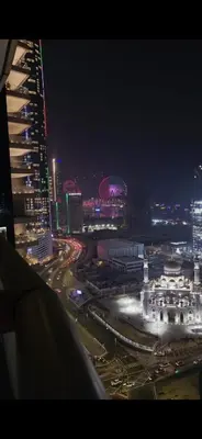 a view of a city at night with buildings at Elite Residence, Marina in Dubai