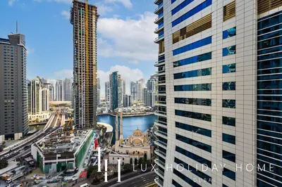 a view of a city skyline with tall buildings at LUX The Sky Dubai Eye View Suite in Dubai