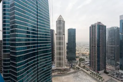 an aerial view of a city with tall buildings at GuestReady - 1BR | Elegant Duplex | JLT in Dubai