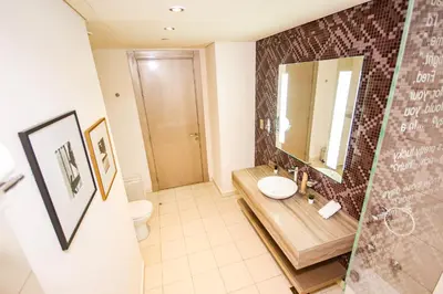 a bathroom with a sink and a mirror at Newly Furnished Luxury 1BHK at Paramount Tower D in Dubai