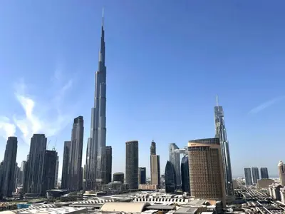 a view of a city skyline with the tallest building at Premium 2BR Burj Khalifa View at Vida Dubai Mall in Dubai
