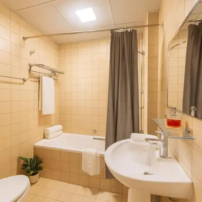 a bathroom with a sink and a bath tub at Luxury studio in Dubai Marina in Dubai