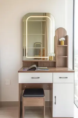 a bathroom with a vanity with a mirror and a sink at Cozy 2BR Apartment in Dubai Hills with Cinema and Lounge Access in Dubai