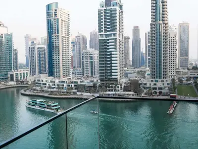 a view of a city with a river and buildings at Full Dubai Marina View 2BR Apartment in Dubai