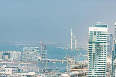 a view of a city with tall buildings and water at Sky Palace 3 Bedroom Penthouse on JBR in Dubai
