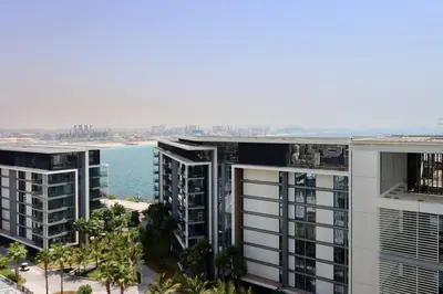 an aerial view of buildings and the ocean at Modern 2BDR in Bluewaters Beach&Pool in Dubai