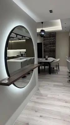 a room with a mirror and a dining room at Burj, Canal & Dubai Mall Luxe Stay for 6 in Dubai