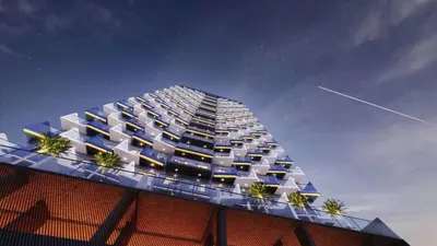 a rendering of a building with blue and yellow windows at Modern 1BR in JVC, Pool & Gym Near Circle Mall in Dubai