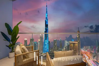 a room with a view of the tallest building in the world at LUX The Vida Burj Khalifa View Suite in Dubai
