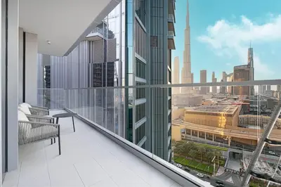 a balcony with a view of a city at 4BR Luxury Hotel Amenities Dubai Mall Access in Dubai