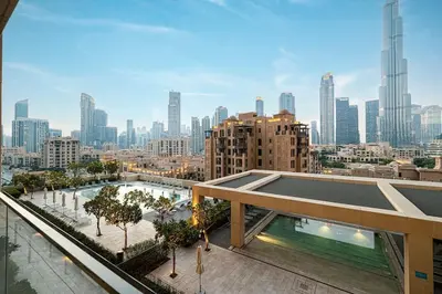 a view of a city skyline from a building at Designer 2BR, Burj Khalifa View & Dubai Mall 2 minutes walk in Dubai