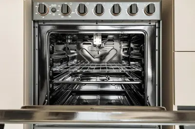 an open oven with a car inside of it at 2.5BR Villa | PS5 & Private Pool | Near Dubai Mall in Dubai