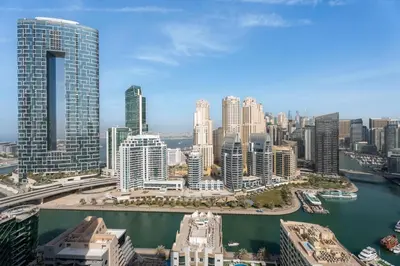 an aerial view of a city with tall buildings at GuestReady | Studio | Cozy Apt with Marina View in Dubai