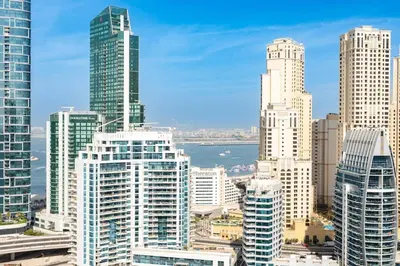a view of a city skyline with tall buildings at GuestReady | Studio | Cozy Apt with Marina View in Dubai