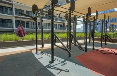 a gym in a building with a hanging object at Luxury Studio Business Bay Short Stays Long Stays in Dubai