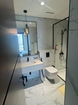 a bathroom with a sink and a toilet at Luxury Brand new 2BR nearby DIFC in Dubai