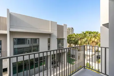 a view of a building from a balcony at MAG City Private Villa, 3BR with Pool, Garden & BBQ in Dubai