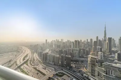 an aerial view of a city with tall buildings at VayK - Luxurious 3BR in Business Bay with Burj Khalifa View in Dubai