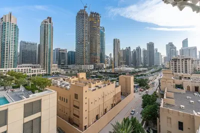 a view of a city with tall buildings at Charming Oasis Near Dubai Mall & Burj Khalifa in Dubai