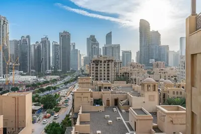 a city view of a city with tall buildings at Charming Oasis Near Dubai Mall & Burj Khalifa in Dubai