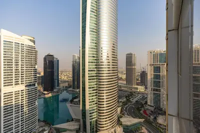 a view of a city skyline with tall buildings at Waves - Vibrant JLT Stay - Modern Funky Studio in Dubai