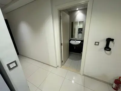 a bathroom with a sink and a toilet at Premium 1BR Apartment In Damac Ghalia with City View & Balcony in Dubai