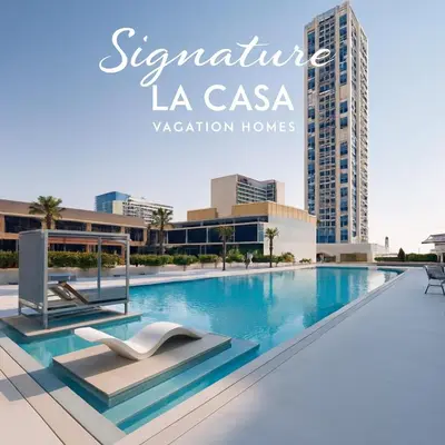 a magazine cover of a swimming pool in a city at Premium 1BR Apartment In Damac Ghalia with City View & Balcony in Dubai