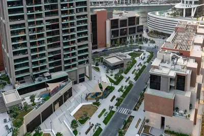 an aerial view of a city with tall buildings at Modern Studio Canal & Pool View Business Bay in Dubai