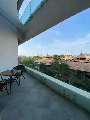 a balcony with a table and a view of the city at Entire House in Palm Jumeriah with a Sea View in Dubai