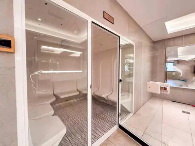 a bathroom with a glass walk in closet at Elite Downtown Residence1 Lake View Studio Balcony Apartment in Dubai