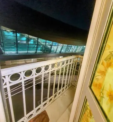 a view from the top of a balcony with a window at Studio in discovery garden Near gardens metro station in Dubai