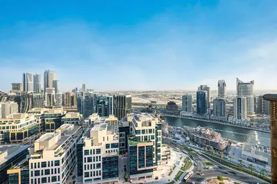 an aerial view of a city with tall buildings at Spacious & cozy Studio in Downtown! in Sabkhah
