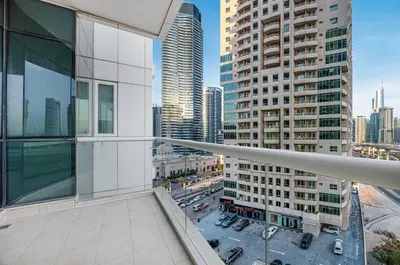 a view of a city from the balcony of a building at FiveX Premium 2BR at Trident Waterfront Marina in Dubai