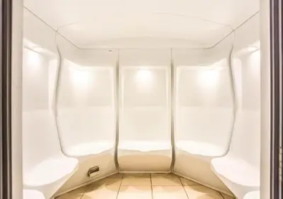 an empty room with white walls and a ceiling at Royal Marina Inn in Dubai