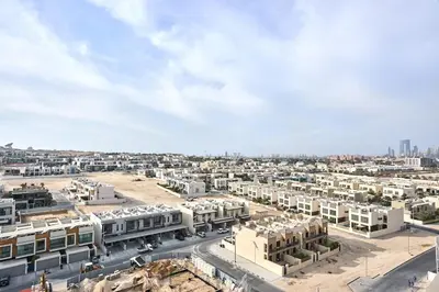 an aerial view of a city with buildings at 2 Bedroom Apartment Close to Miracle Tower in Dubai