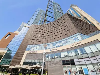 a large building with a lot of windows at Dubai Marina Luxury 1 BDR Holiday Apartment - Dubai Marina Walk in Dubai
