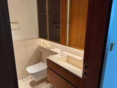 a bathroom with a sink and a toilet at 1 BR apartment in Ellington Beach House in Dubai