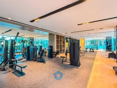a gym with treadmills and exercise equipment in a building at NEXT TO DUBAI MALL AND BURJ 2BR in Dubai