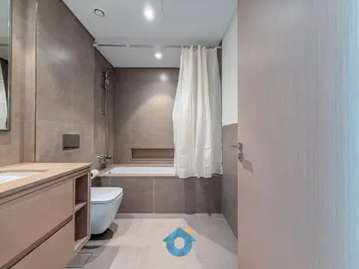 a bathroom with a tub and a toilet and a shower at NEXT TO DUBAI MALL AND BURJ 2BR in Dubai
